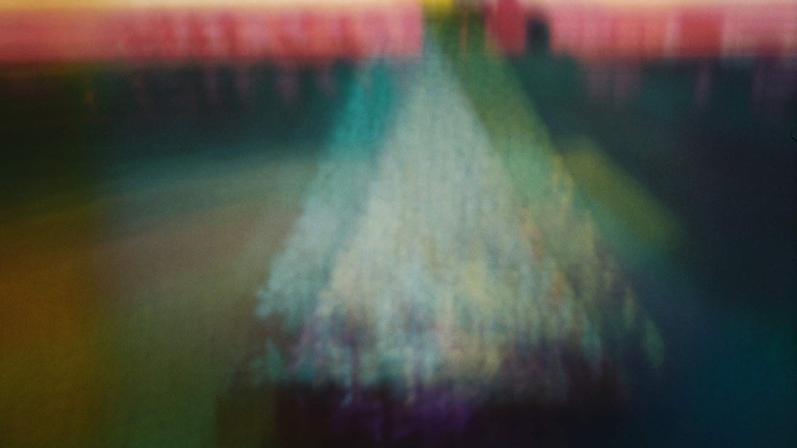 Abstract blurred image suggesting a home-like space.