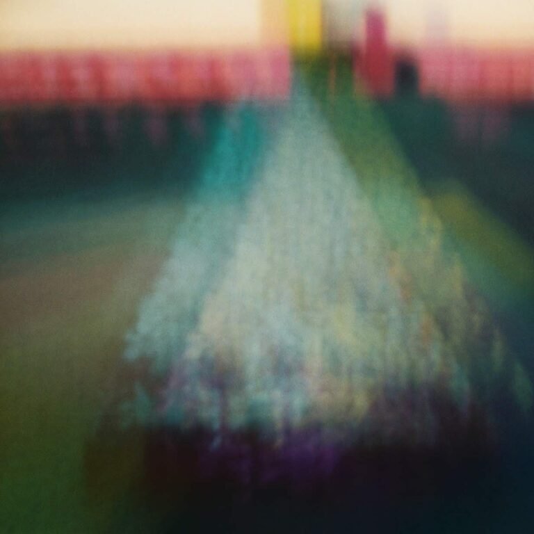 Abstract blurred image suggesting a home-like space.