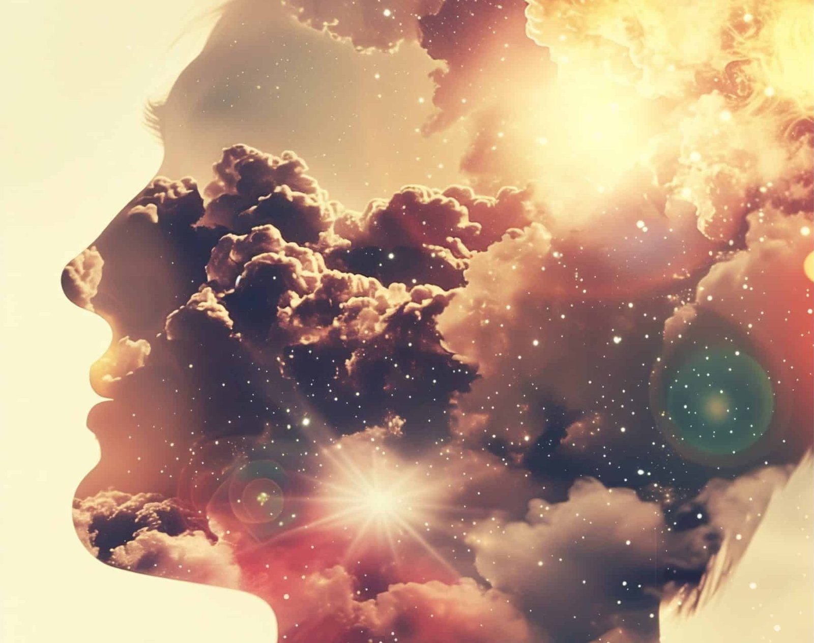 Silhouette of a head filled with clouds and stars, representing transpersonal therapy.